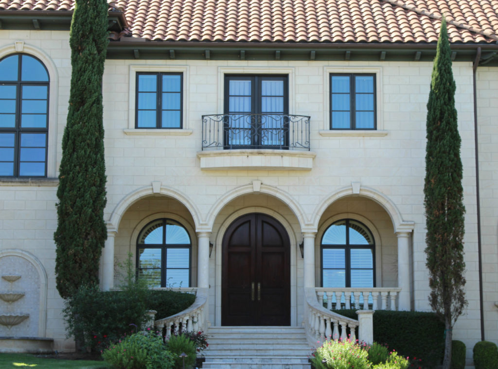 Limestone columns balusters window surrounds and cladding