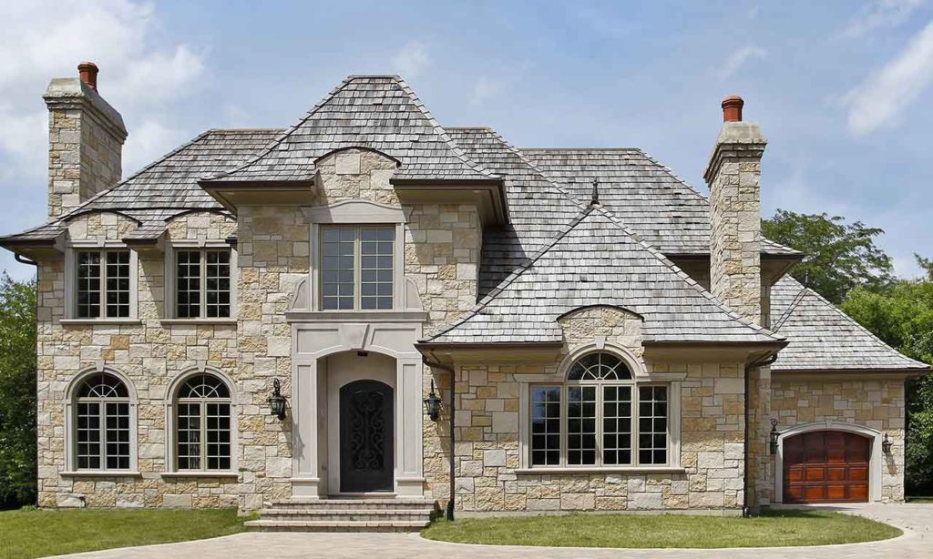 custom stone door and window surrounds