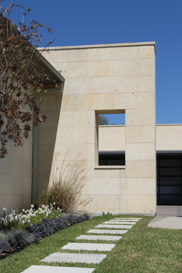Shell Limestone wall cladding on the exterior of a home.